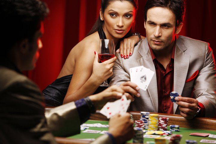 Live dealer studio with multiple camera angles broadcasting baccarat table