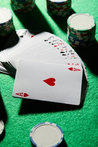 Split-screen showing jnetoto togel app on phone with live blackjack table and betting interface